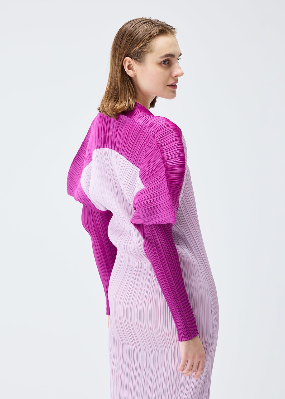A model wears the PLEATS PLEASE ISSEY MIYAKE SQUARE dress.