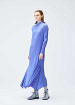 A model wears the PLEATS PLEASE ISSEY MIYAKE OLE! clothing.