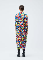 A model wears the PLEATS PLEASE ISSEY MIYAKE DANCING SQUARE dress.