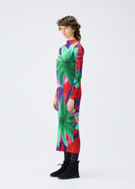 A model wears the PLEATS PLEASE ISSEY MIYAKE CARNIVAL dress.