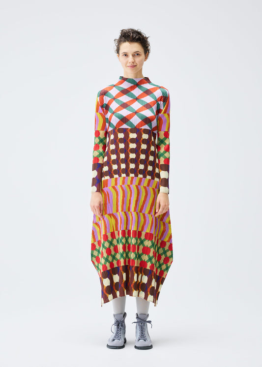 A model wears the PLEATS PLEASE ISSEY MIYAKE HARMONY clothing.