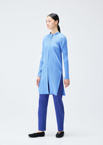 A model wears the PLEATS PLEASE ISSEY MIYAKE PLEATS SHIRT shirt.