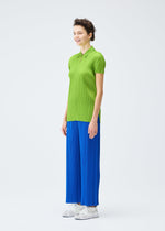 A model wears the PLEATS PLEASE ISSEY MIYAKE MONTHLY COLORS AUGUST top.