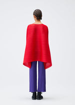 A model wears the PLEATS PLEASE ISSEY MIYAKE MIX top.