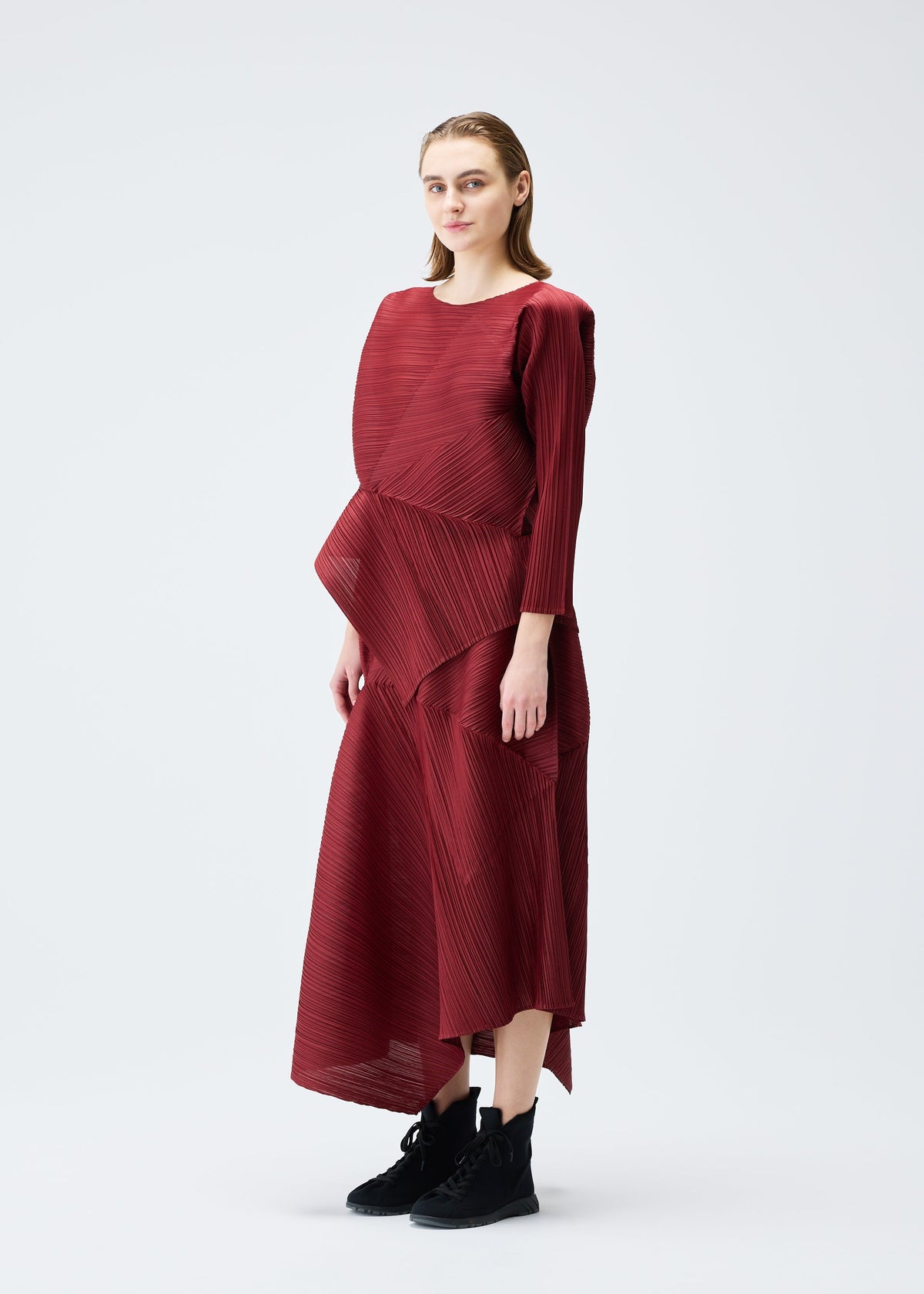 A model wears the PLEATS PLEASE ISSEY MIYAKE SPIN top.