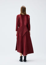 A model wears the PLEATS PLEASE ISSEY MIYAKE SPIN top.