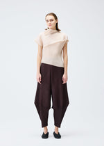 A model wears the PLEATS PLEASE ISSEY MIYAKE LEAP top.