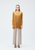 A model wears the PLEATS PLEASE ISSEY MIYAKE EFFICIENT SQUARE 2 clothing.