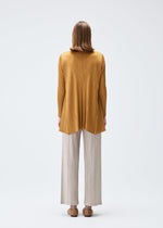 A model wears the PLEATS PLEASE ISSEY MIYAKE EFFICIENT SQUARE 2 clothing.