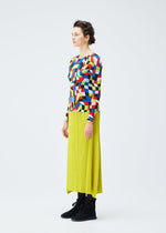 A model wears the PLEATS PLEASE ISSEY MIYAKE DANCING SQUARE top.