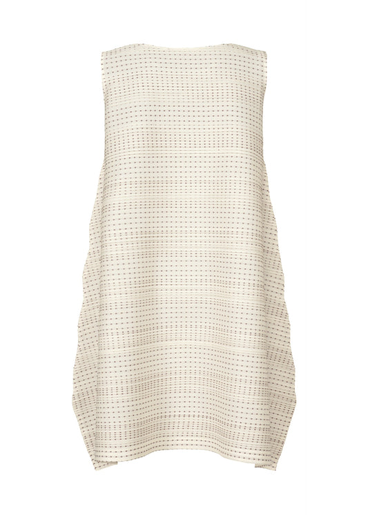 A detail shot of the PLEATS PLEASE ISSEY MIYAKE COTTON SKIP tunic.