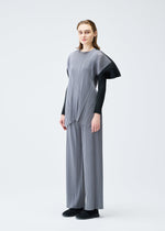A model wears the PLEATS PLEASE ISSEY MIYAKE SQUARE tunic.