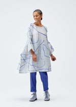 A model wears the PLEATS PLEASE ISSEY MIYAKE PAUSE tunic.