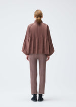 A model wears the PLEATS PLEASE ISSEY MIYAKE SMOOTH COAT jacket.
