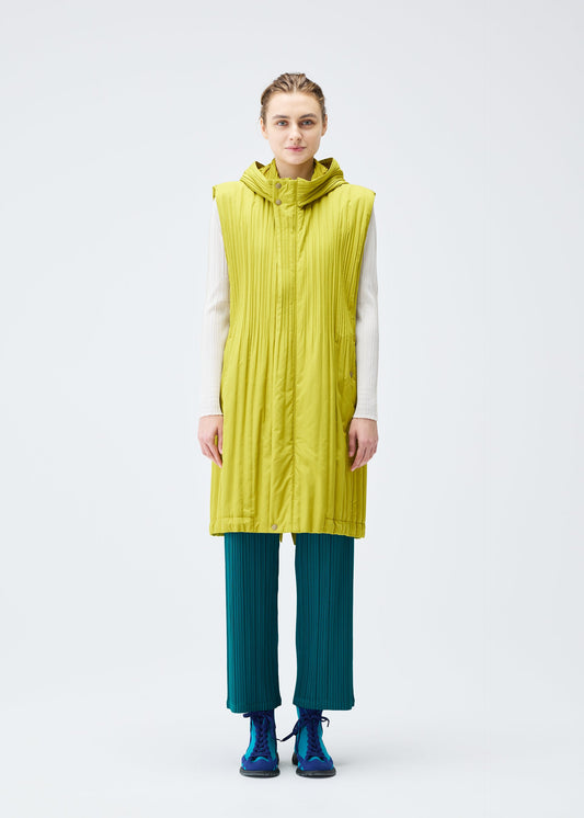 A model wears the PLEATS PLEASE ISSEY MIYAKE PADDED PLEATS COAT vest.