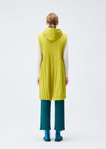 A model wears the PLEATS PLEASE ISSEY MIYAKE PADDED PLEATS COAT vest.
