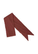 A product shot of the PLEATS PLEASE ISSEY MIYAKE MONTHLY SCARF OCTOBER stole in brown red (45).