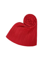 A detail shot of the PLEATS PLEASE ISSEY MIYAKE MADAME T NOVEMBER stole.