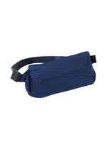 A detail shot of the PLEATS PLEASE ISSEY MIYAKE BIAS PLEATS WAISTBAG bag.