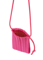A detail shot of the PLEATS PLEASE ISSEY MIYAKE DEWDROP PLEATS BAG bag.
