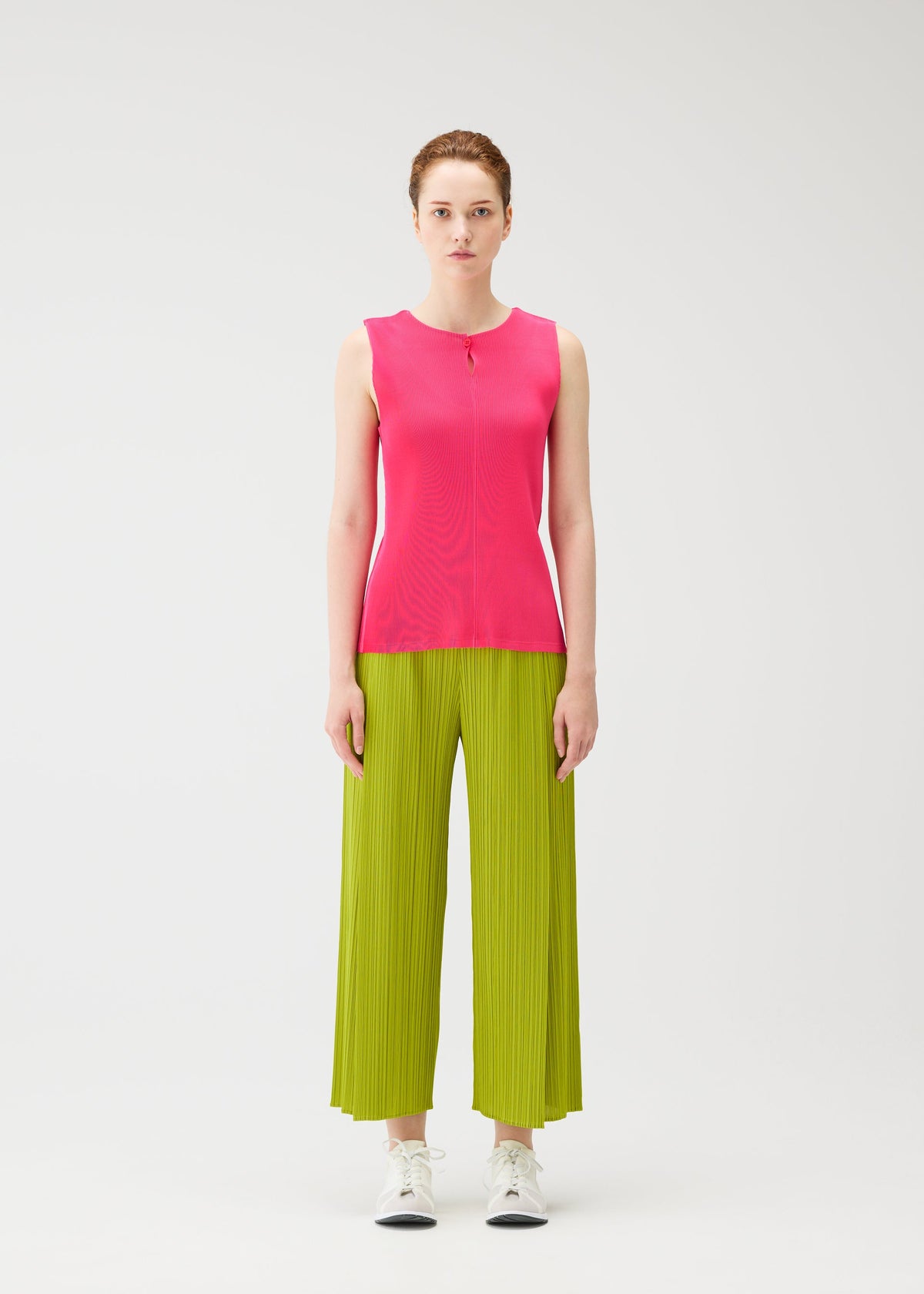 A model wears the PLEATS PLEASE ISSEY MIYAKE MIST JUNE mist-june-shirt-charcoal.