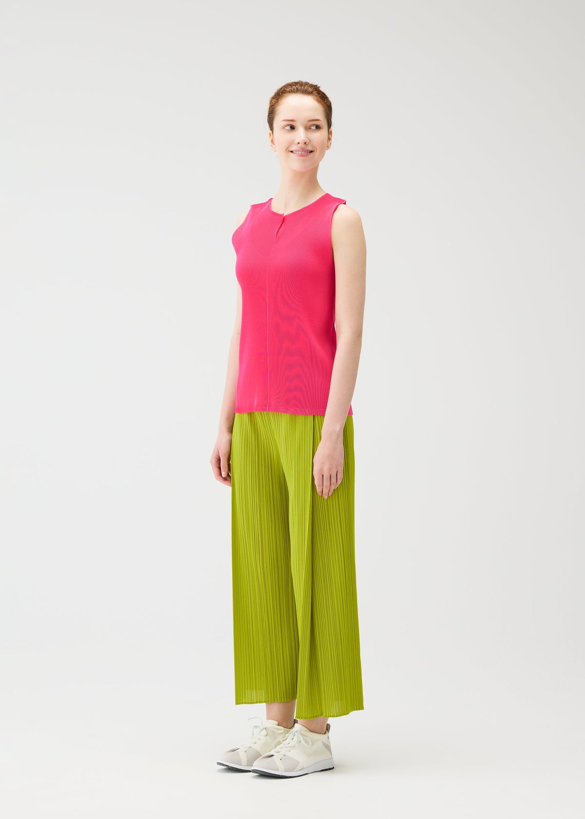 A model wears the PLEATS PLEASE ISSEY MIYAKE MIST JUNE mist-june-shirt-charcoal.