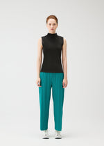 A model wears the PLEATS PLEASE ISSEY MIYAKE MIST JUNE mist-june-shirt-charcoal-1.