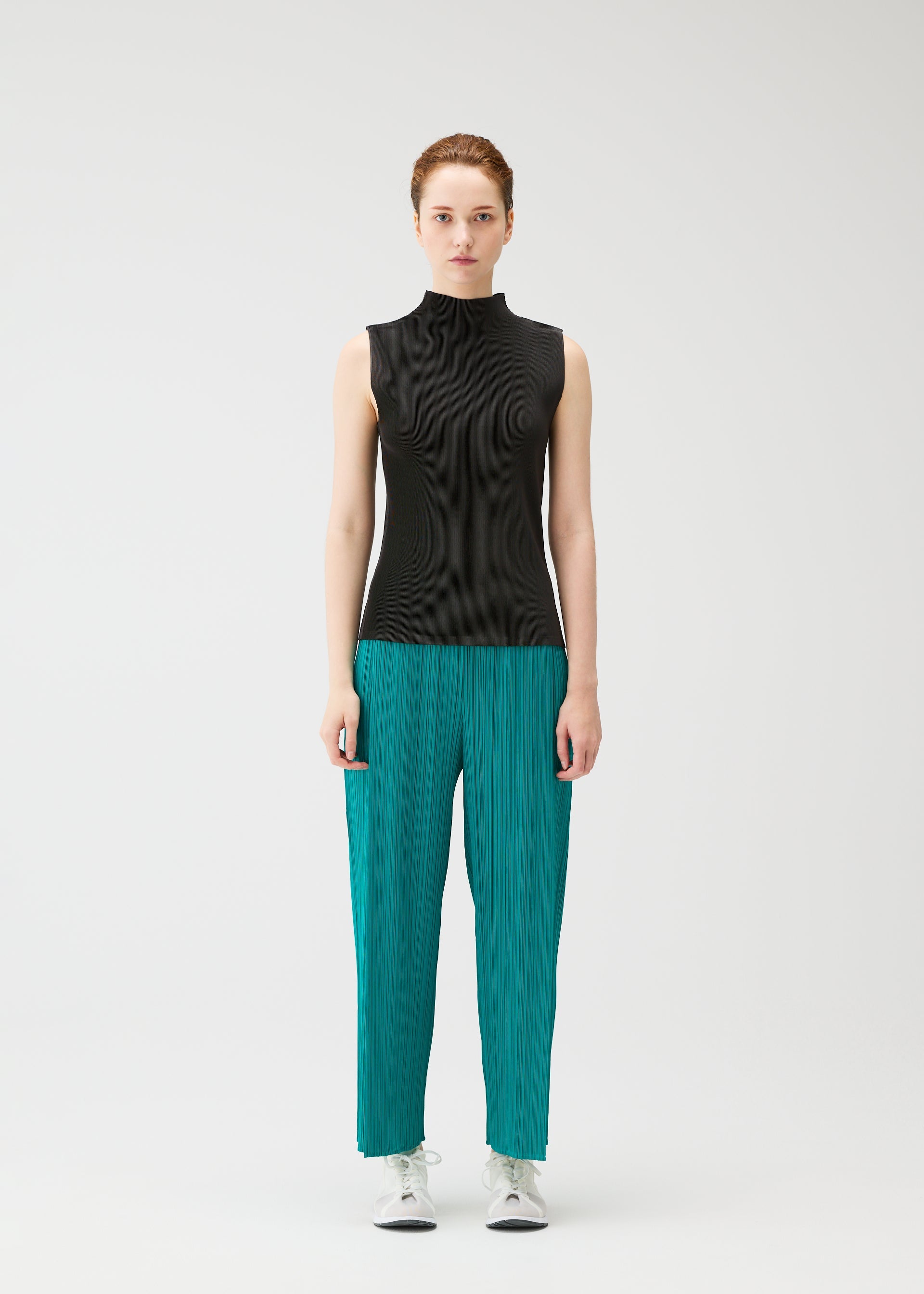 A model wears the PLEATS PLEASE ISSEY MIYAKE MIST JUNE mist-june-shirt-charcoal-1.