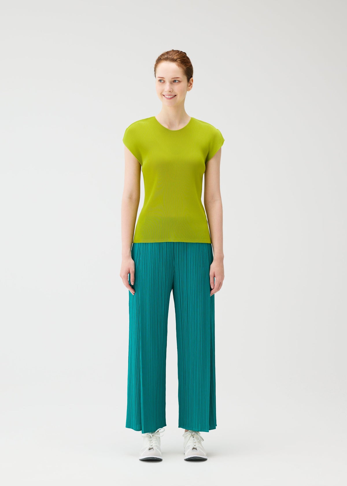 A model wears the PLEATS PLEASE ISSEY MIYAKE MIST JUNE mist-june-shirt-charcoal-2.