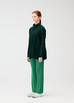 A model wears the PLEATS PLEASE ISSEY MIYAKE FLOAT COAT cardigan.