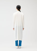 A model wears the PLEATS PLEASE ISSEY MIYAKE MONTHLY COLORS FEBRUARY coat.