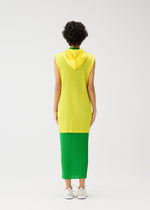 A model wears the PLEATS PLEASE ISSEY MIYAKE MONTHLY COLORS APRIL vest.