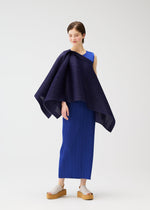 A model wears the PLEATS PLEASE ISSEY MIYAKE LUCID PLEATS vest.