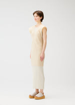 A model wears the PLEATS PLEASE ISSEY MIYAKE LUCID PLEATS vest.