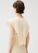 A model wears the PLEATS PLEASE ISSEY MIYAKE LUCID PLEATS vest.