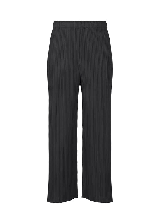 A product shot of the PLEATS PLEASE ISSEY MIYAKE MONTHLY COLORS FEBRUARY trousers in black (15).