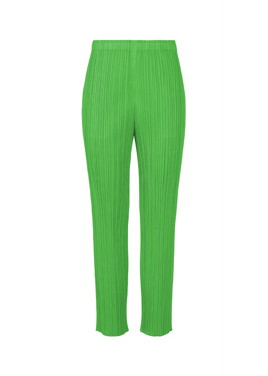 A product shot of the PLEATS PLEASE ISSEY MIYAKE MONTHLY COLORS APRIL trousers in green (62).