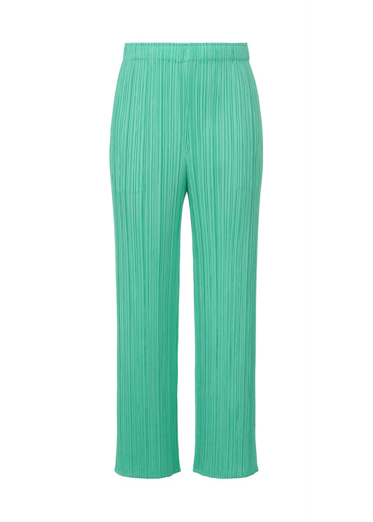 A product shot of the PLEATS PLEASE ISSEY MIYAKE MONTHLY COLORS MAY trousers in turquoise green (66).