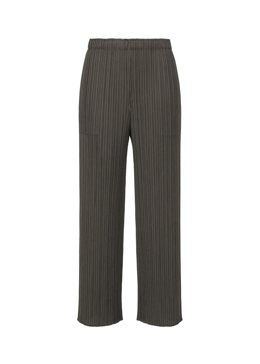 A product shot of the PLEATS PLEASE ISSEY MIYAKE MONTHLY COLORS : JUNE trousers in charcoal.