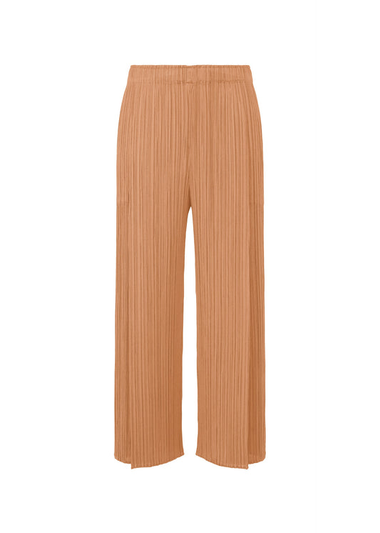 A product shot of the PLEATS PLEASE ISSEY MIYAKE MONTHLY COLORS : JUNE trousers in pink beige.