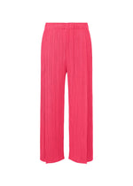 A product shot of the PLEATS PLEASE ISSEY MIYAKE MONTHLY COLORS : JUNE trousers in bright pink.