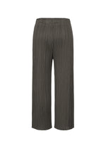 A detail shot of the PLEATS PLEASE ISSEY MIYAKE MONTHLY COLORS : JUNE trousers.