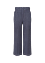 A product shot of the PLEATS PLEASE ISSEY MIYAKE COTTON DENIM trousers in navy (75).