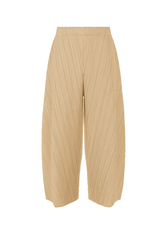 A product shot of the PLEATS PLEASE ISSEY MIYAKE COAST trousers in sand beige (43).