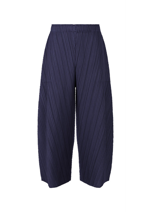 A product shot of the PLEATS PLEASE ISSEY MIYAKE COAST trousers in navy (75).