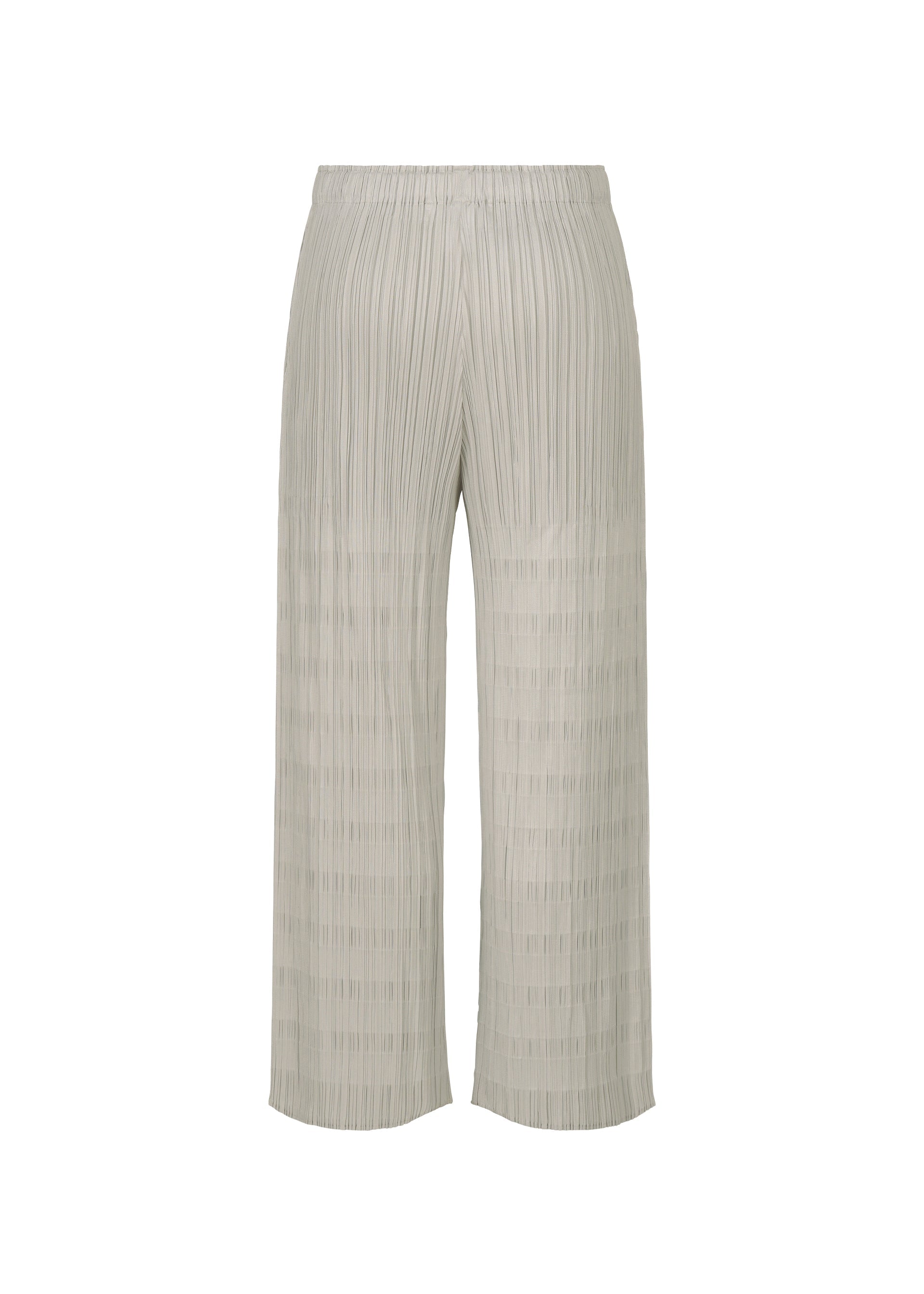 A detail shot of the PLEATS PLEASE ISSEY MIYAKE BUMPY BASKET trousers.