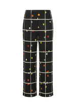 A product shot of the PLEATS PLEASE ISSEY MIYAKE CROSSING DOTS trousers in black (15).