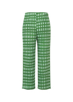A detail shot of the PLEATS PLEASE ISSEY MIYAKE BASKET trousers.