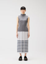 A model wears the PLEATS PLEASE ISSEY MIYAKE BUMPY BASKET bumpy-basket-skirt-charcoal.