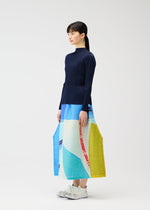 A model wears the PLEATS PLEASE ISSEY MIYAKE CITY COLLAGE clothing.